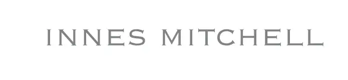 Innes Mitchell logo